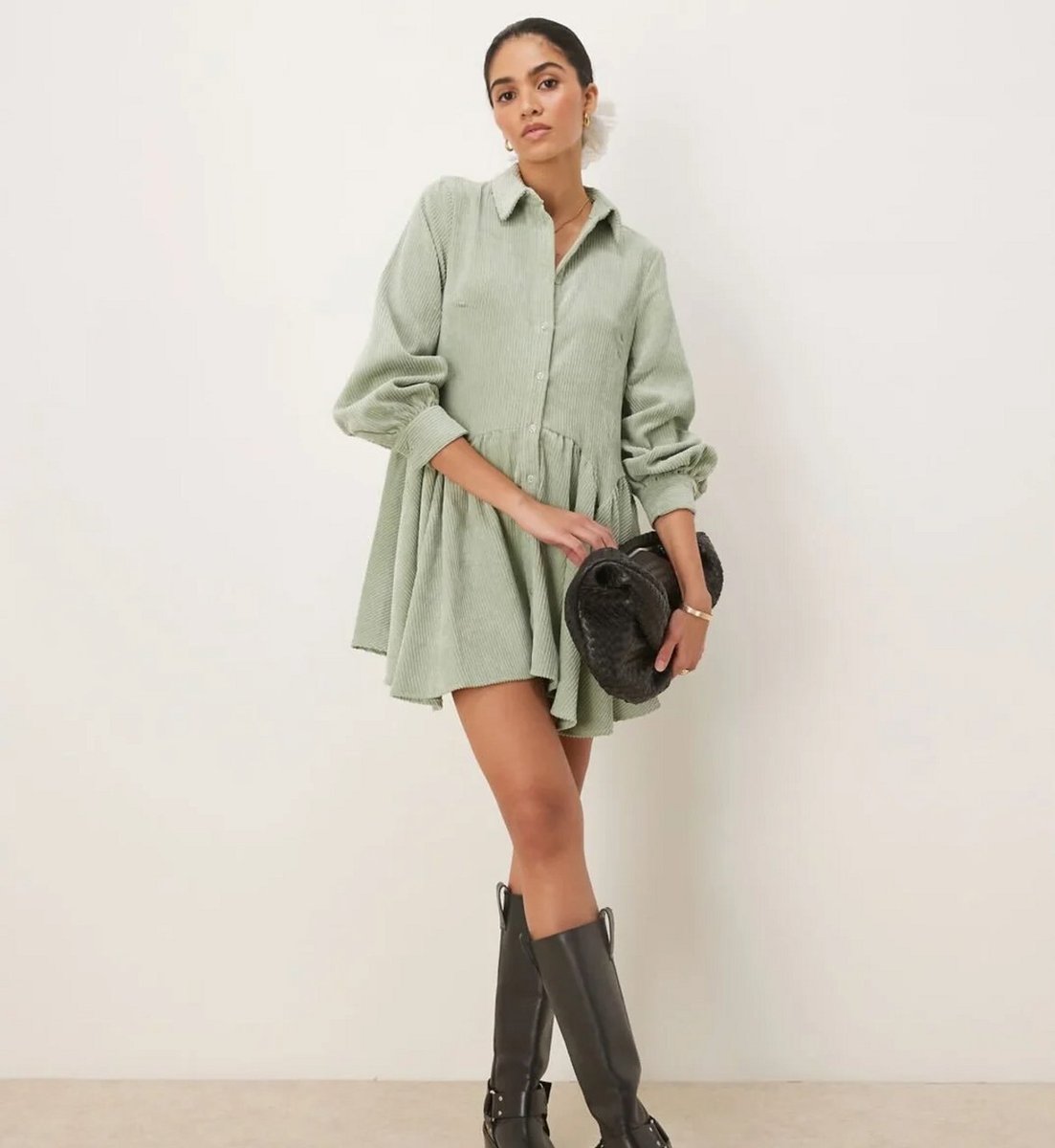 woman wearing sage green ASOS dress