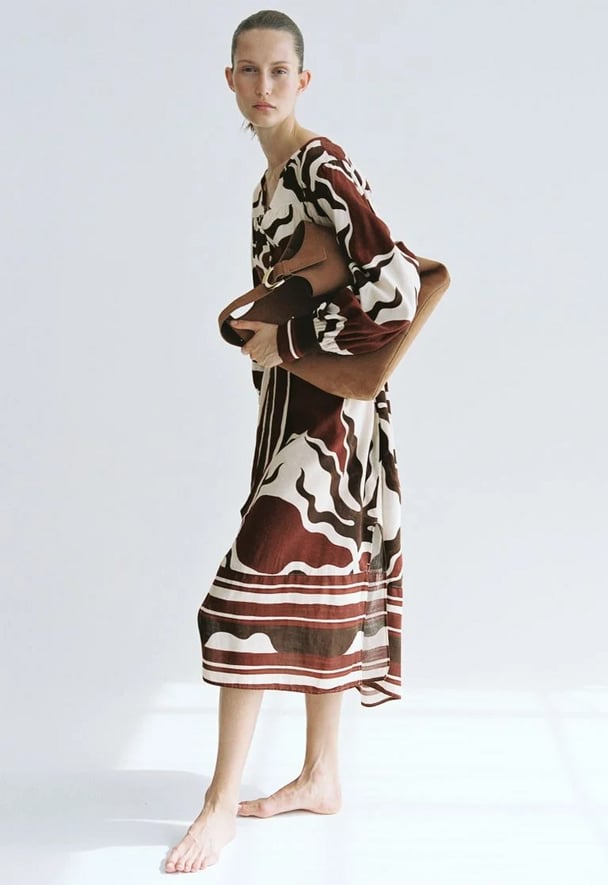 woman wearing kaftan dress