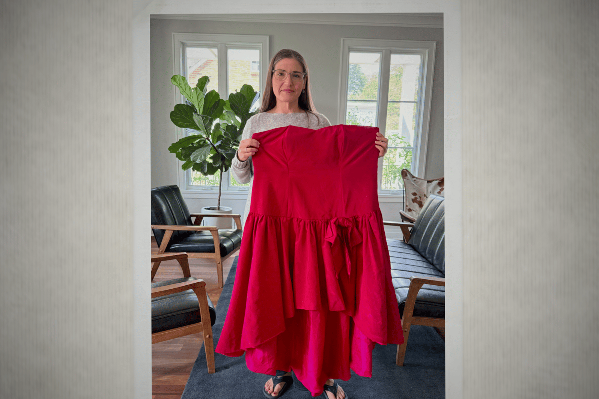 holding-old-dress-larger-size