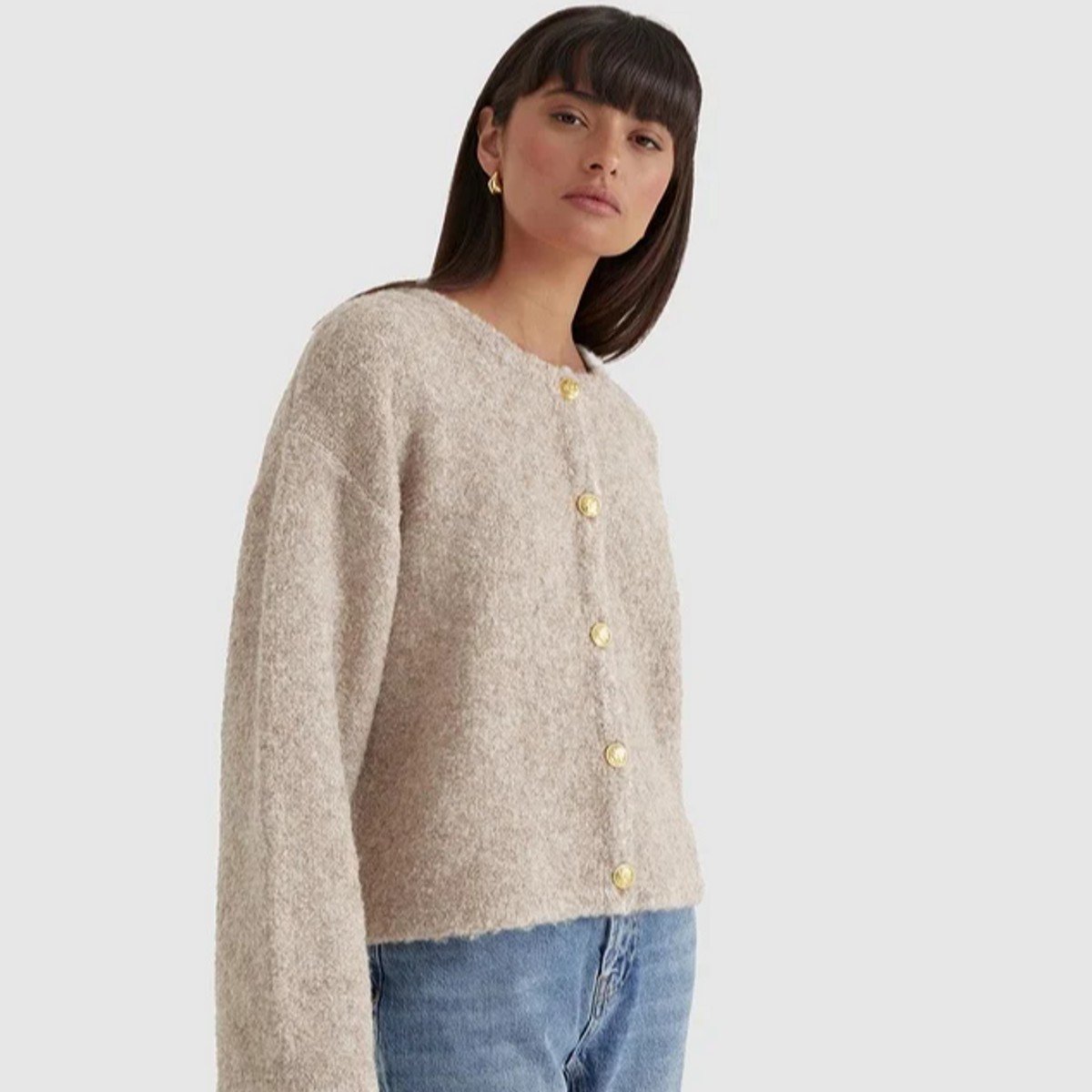 woman wearing cardigan in taupe from 4th & Reckless