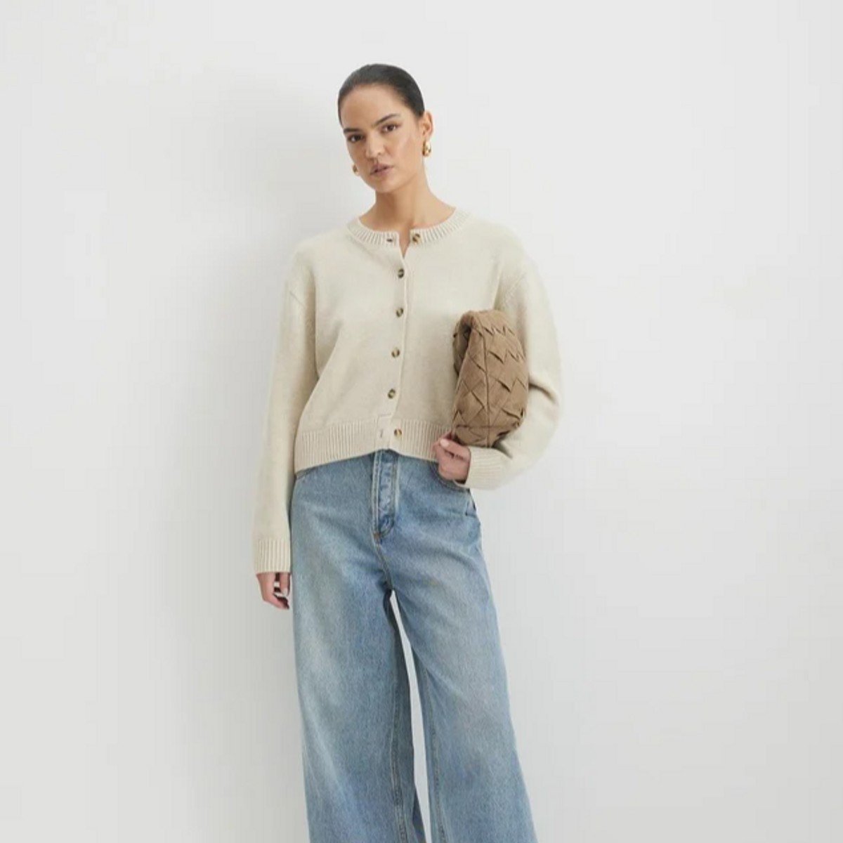 woman wearing wool blend knit cardigan from Aere