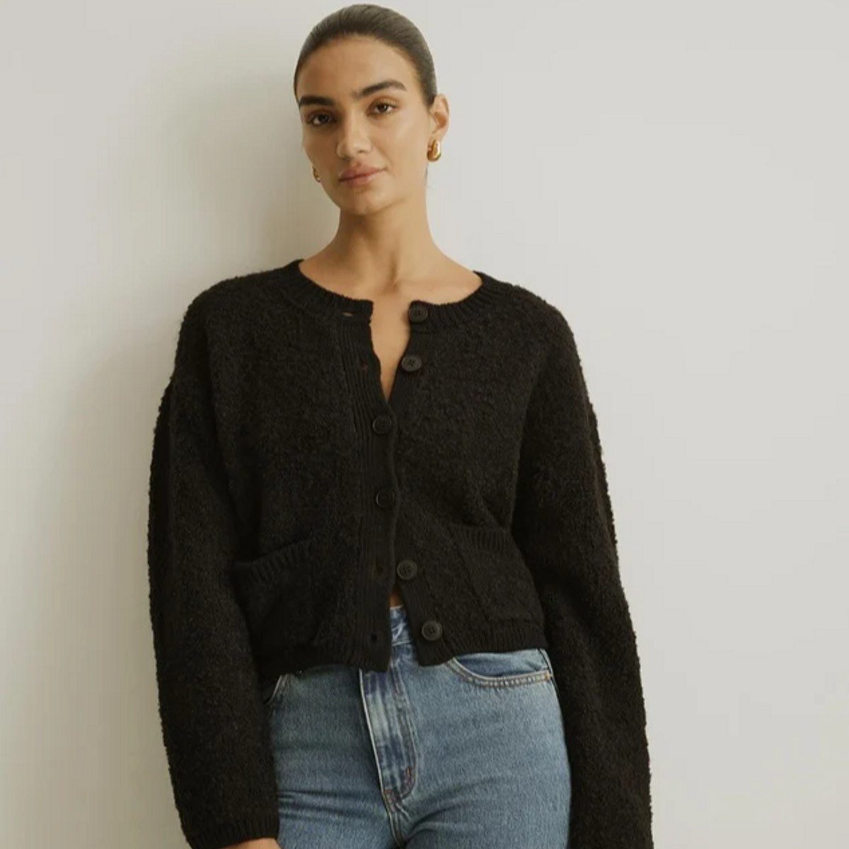woman wearing black crew knit cardigan from Atmos&Here