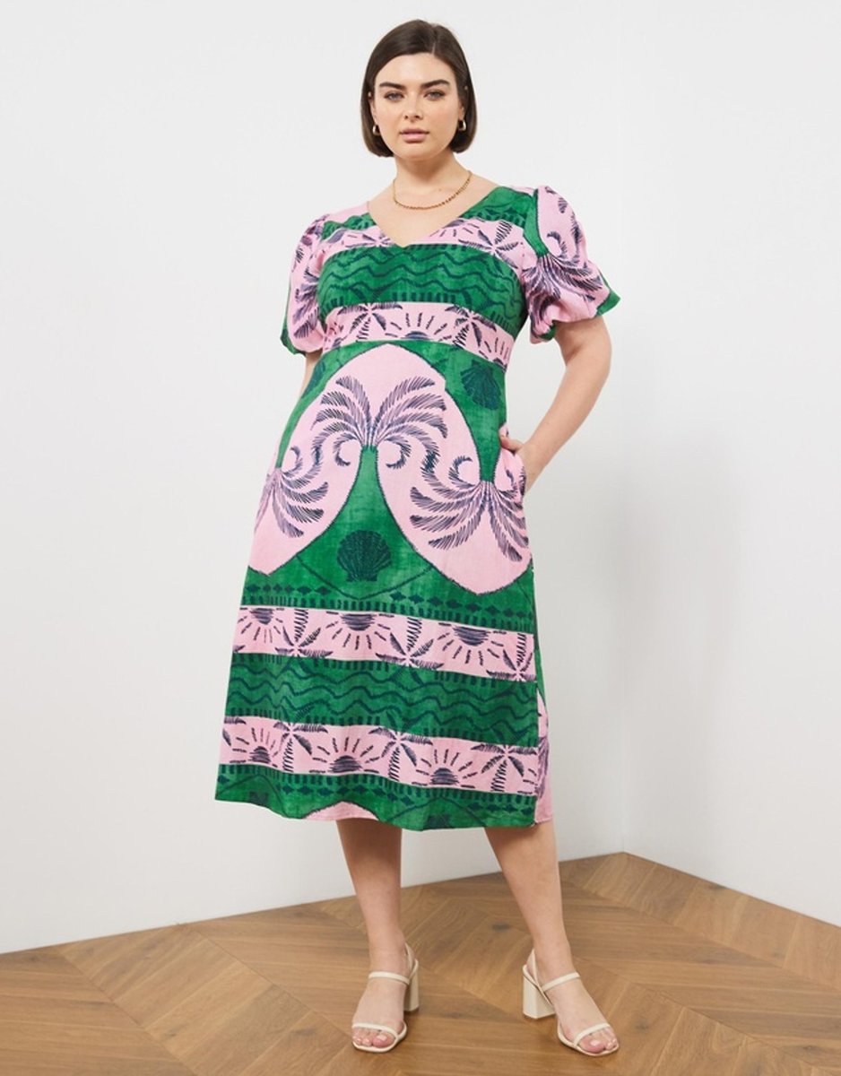 woman wearing Atmos&Here Curve Costa Rica Linen Blend Midi Dress