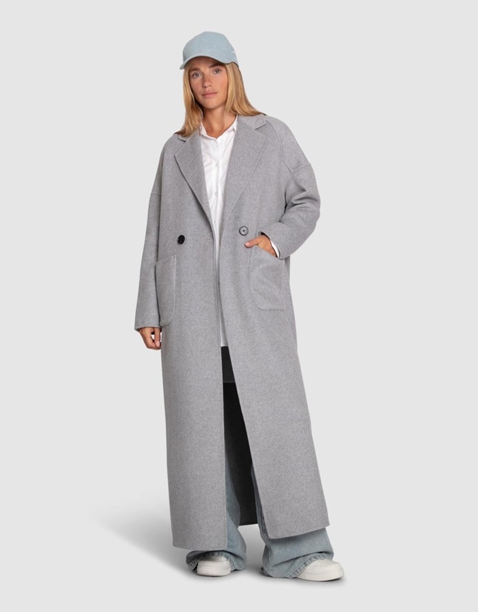 woman wearing grey maxi coat from Belle & Bloom
