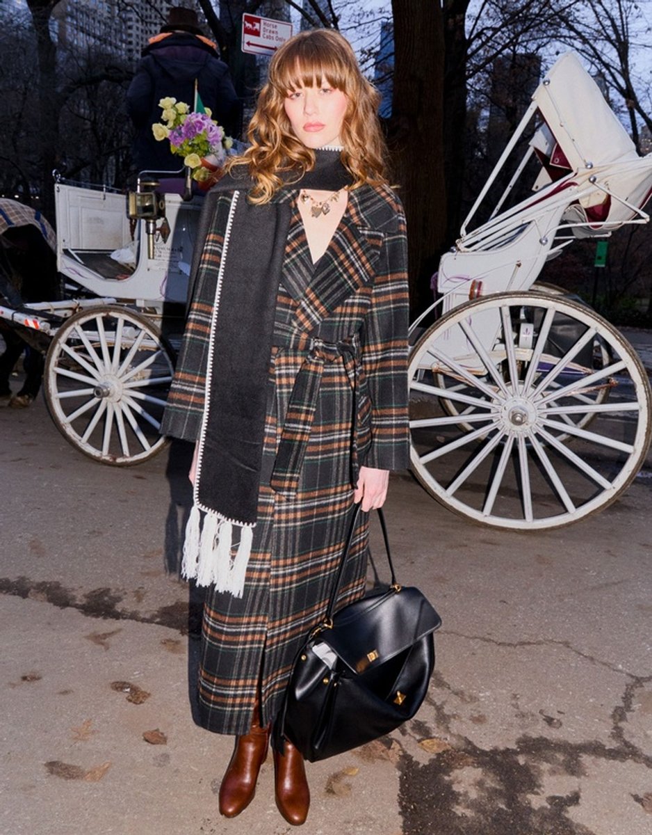 woman wearing maxi coat in black plaid from Belle & Bloom