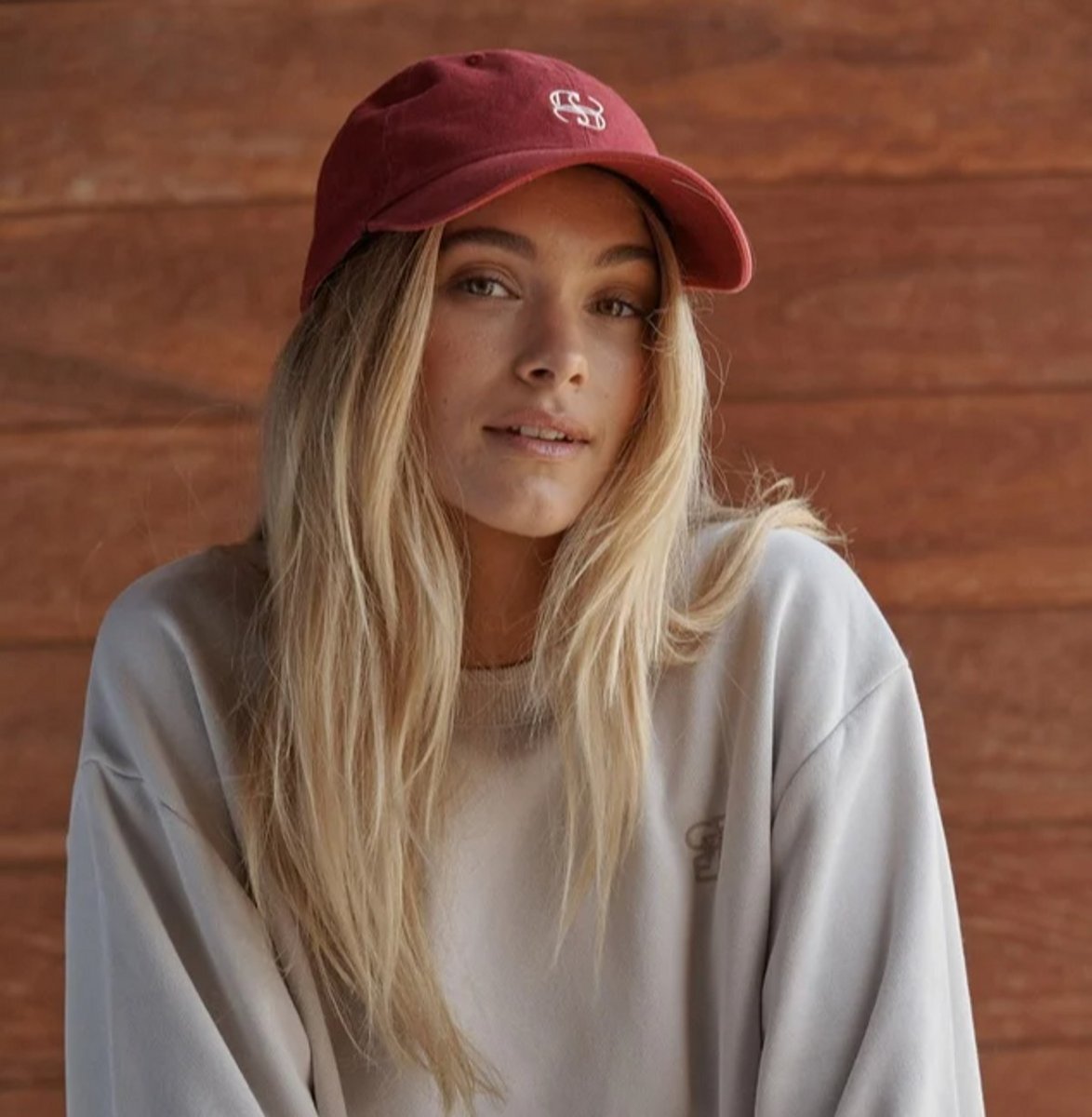 woman wearing a red cap 