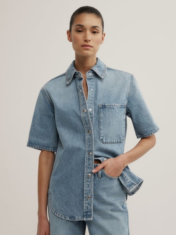 Light wash structured denim short sleeve shirt.