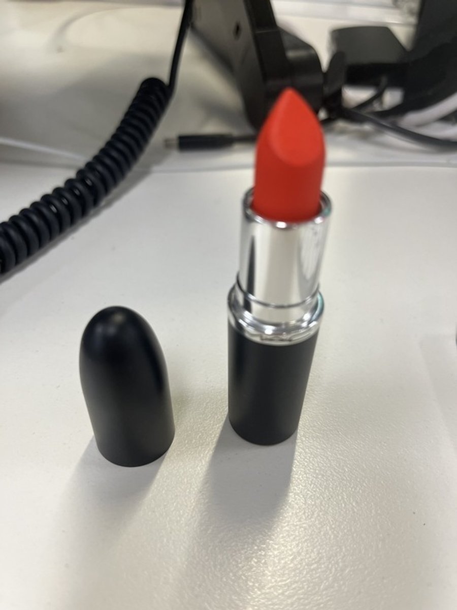 M.A.C. Matte Lipstick - Lady Danger pictured on a work desk.