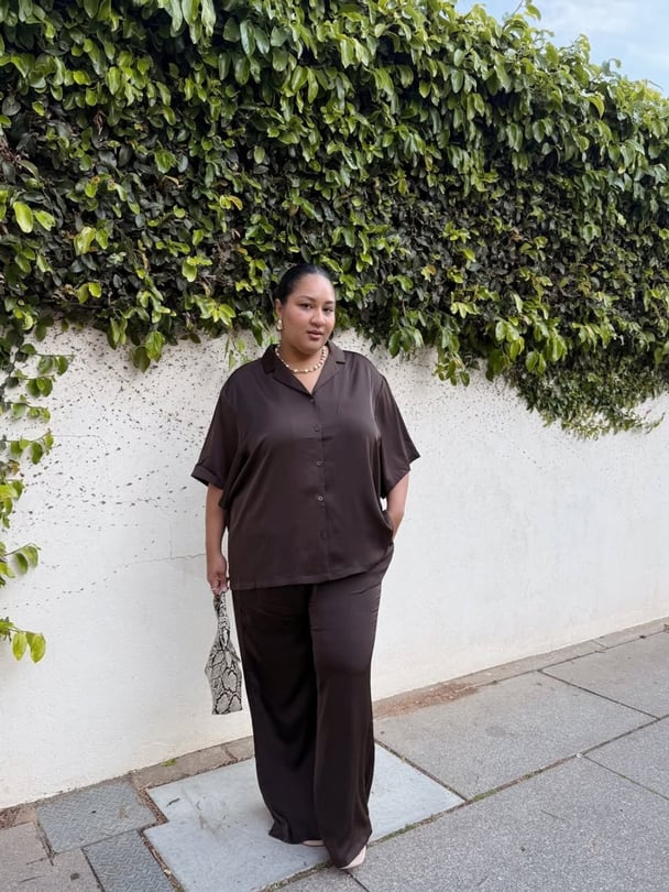 Woman wears matching baggy set.