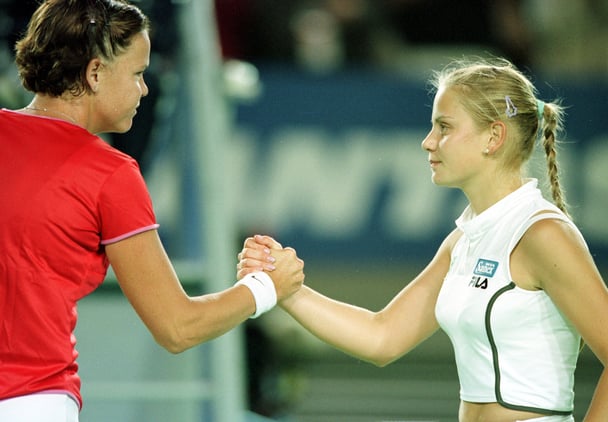 Lindsay Davenport of the USA and Jelena Dokic of Yugoslavia shake hands at the net after their match, in the first round of the Australian Open Tennis Championships
