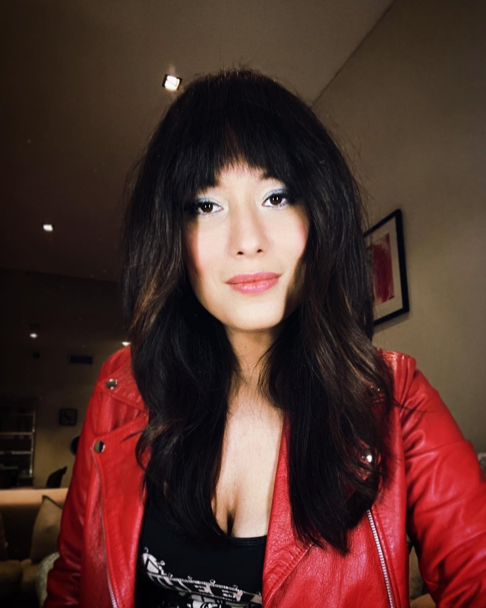 elly-may-barnes-with-fringe-blue-eyeshadow-red-leather-jacket