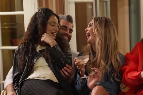 Juliette on Joel's lap laughing with Gia.
