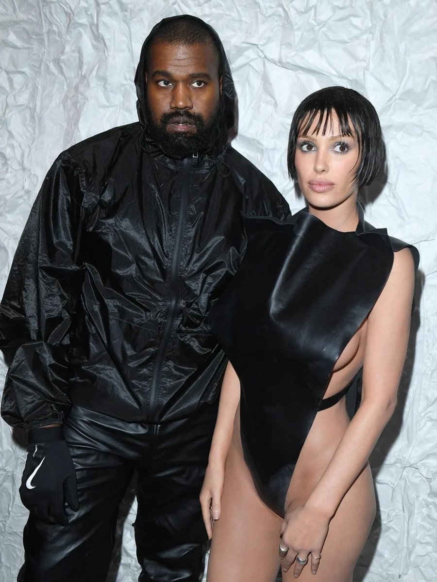 Kanye West and Bianca Censori attend the Marni Fall/Winter 2024 Fashion Show during the Milan Fashion Week wearing all black.