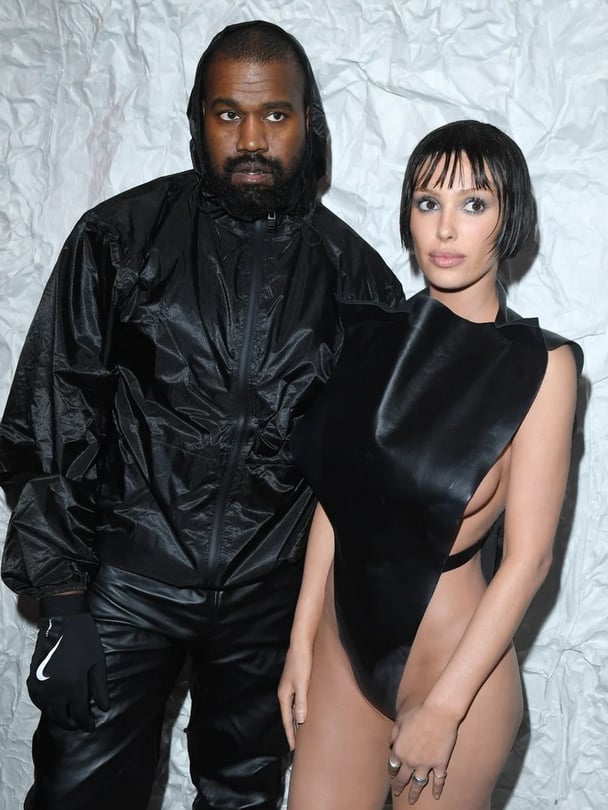 Kanye West and Bianca Censori attend the Marni Fall/Winter 2024 Fashion Show during the Milan Fashion Week wearing all black.