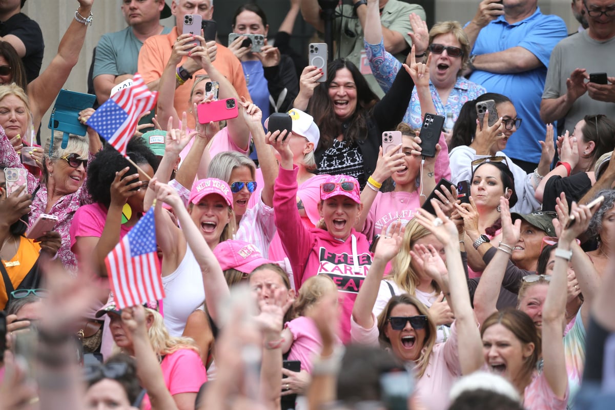 Supporters cheer as the verdicts are read in the Karen Read murder trial.