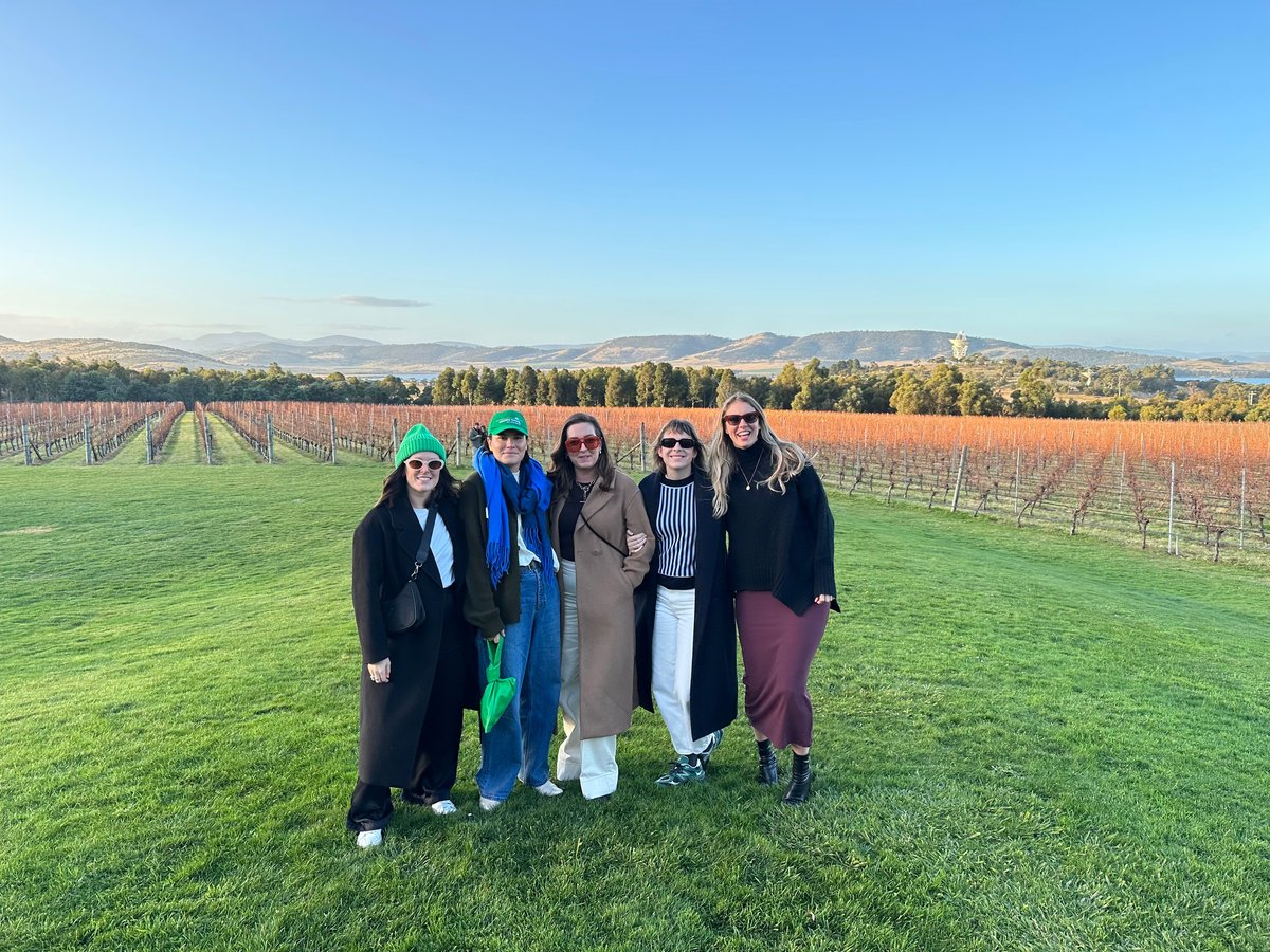Five women standing at a winery in Tasmania.
