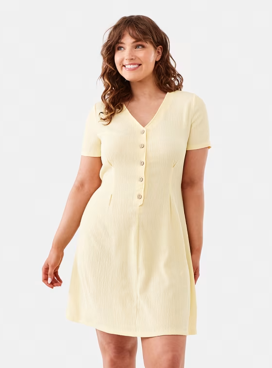 woman wearing butter yellow dress