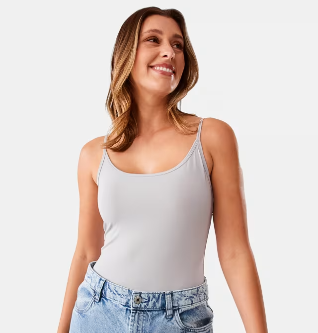 woman wearing grey luxe cami from kmart and jeans 