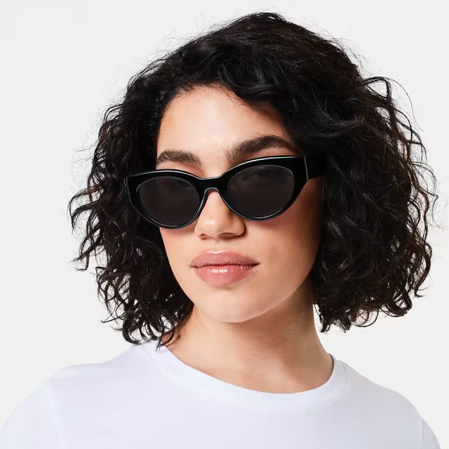 woman wearing black kmart sunglasses 