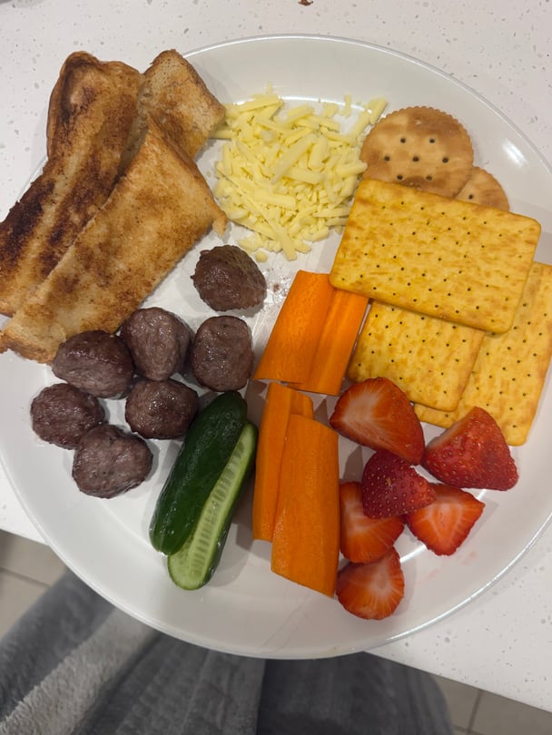 lazy girl dinner hacks with veggies meatball veggies fruit and crackers