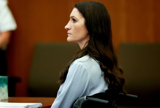 Lindsay Clancy listens to testimony during her murder trial at Plymouth Superior Court.