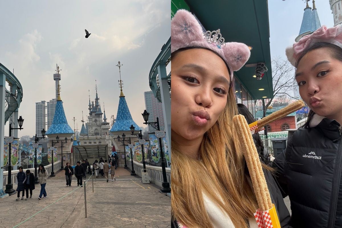 Outdoor amusement park. Two girls selfie with churros.