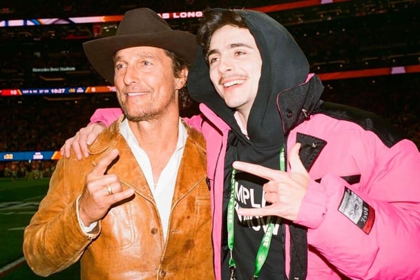 Matthew McConaughey and Timothée Chalamet reunite at the Longhorns game.