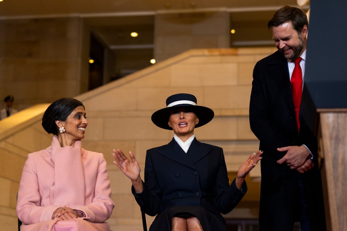 Melania Trump interjects as Trump makes a joke about her outfit choice at Trump's inauguration.