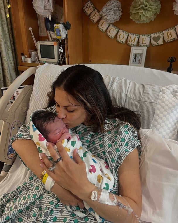 Meredith with baby Carter, whose father hockey player Johnny Gaudreau was killed by an alleged drunk driver.