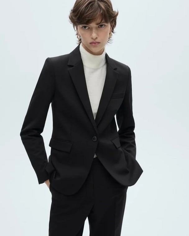 woman wearing black M.N.G blazer