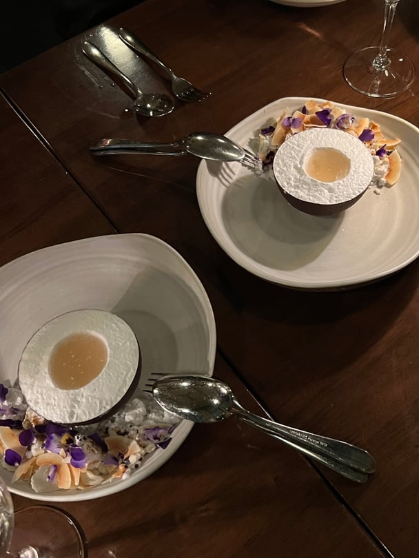 Two plates of coconut dessert.