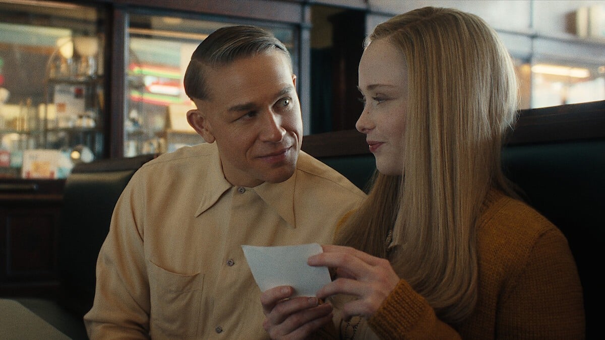 Charlie Hunnam as Ed Gein and Suzanna Son as Adeline Watkins in Netflix's Monster: The Ed Gein Story.