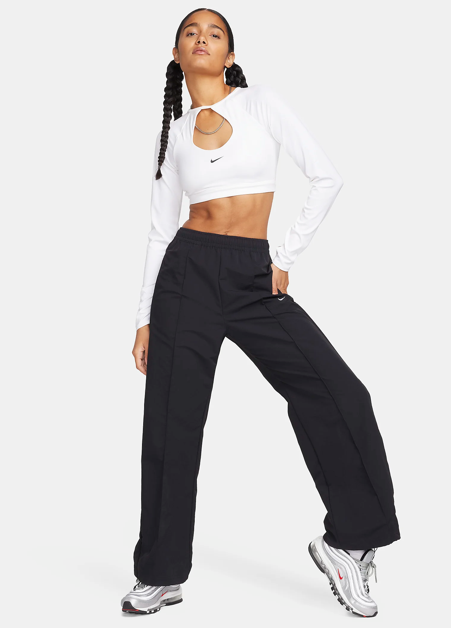 woman wearing wide leg Nike pants 