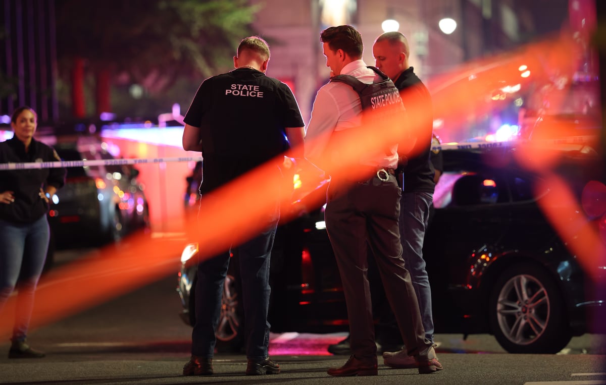 Police work at the scene of a fatal shooting in midtown Manhattan on July 28.
