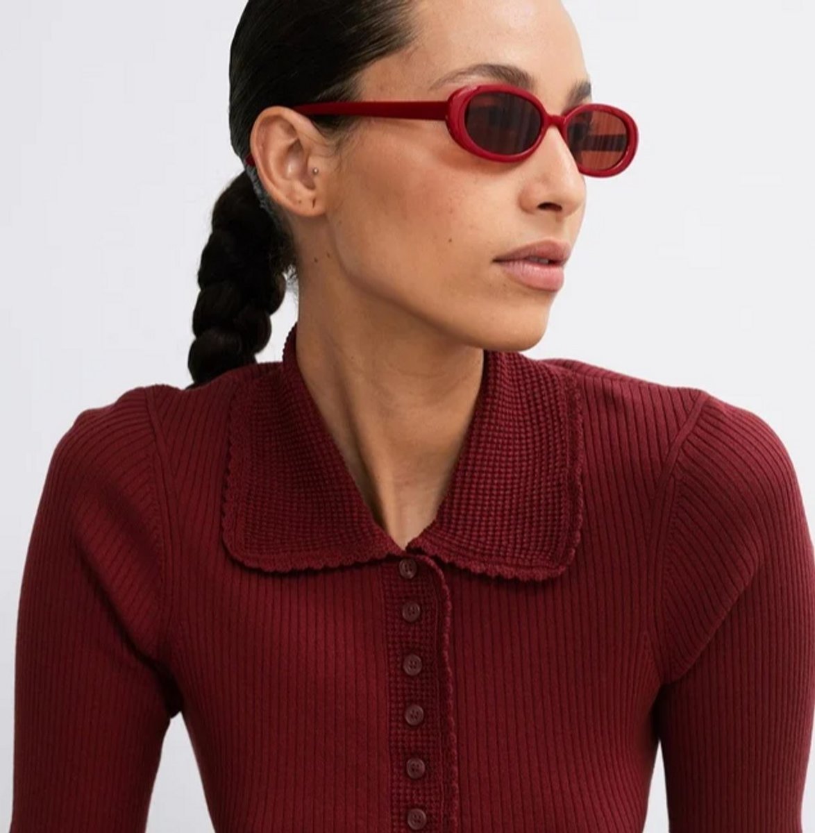 woman wearing red slim frame sunglasses