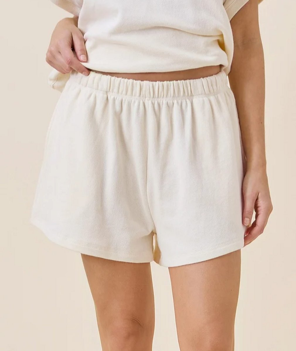 woman wearing butter yellow boxer shorts 