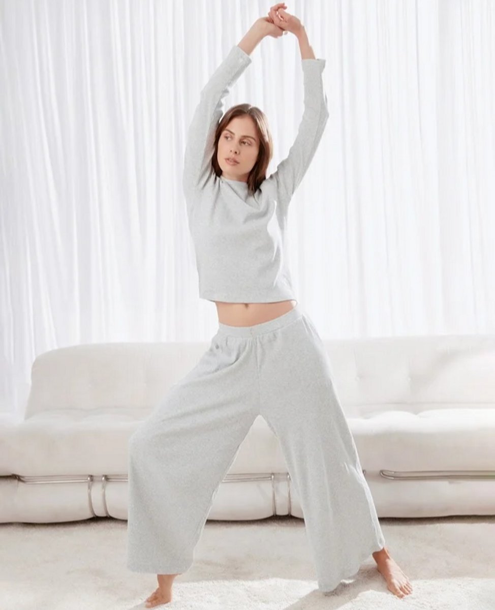 woman wearing grey wide leg pant pj set