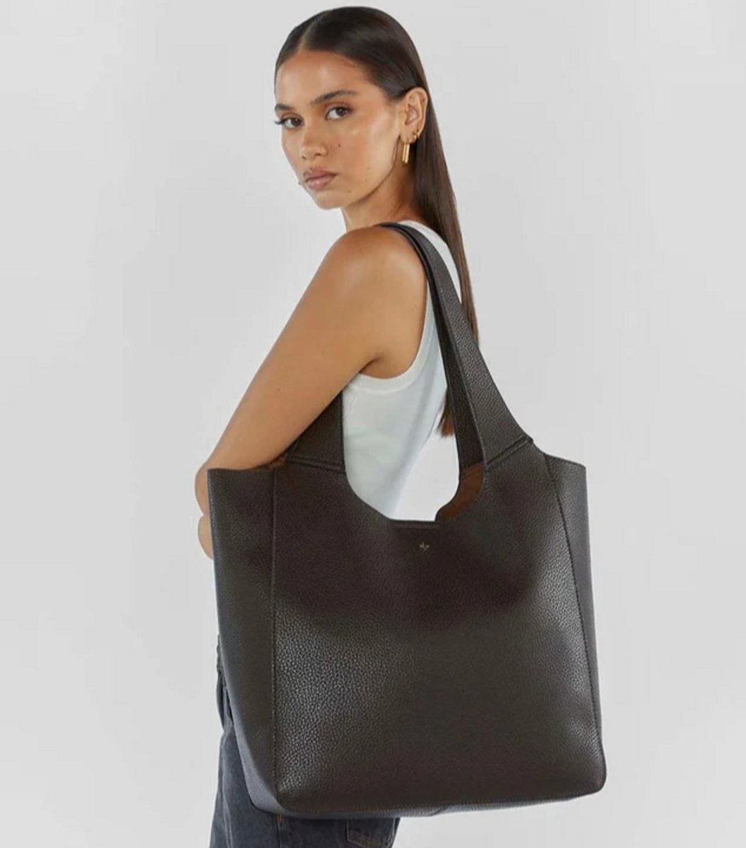 woman with large tote bag