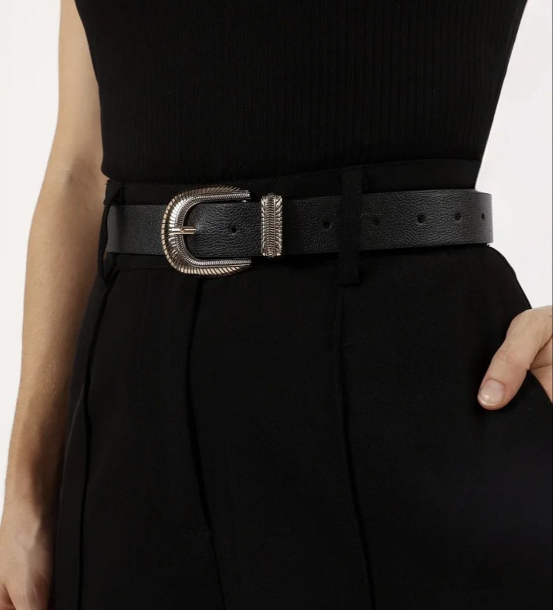 woman wearing a black fashion belt 