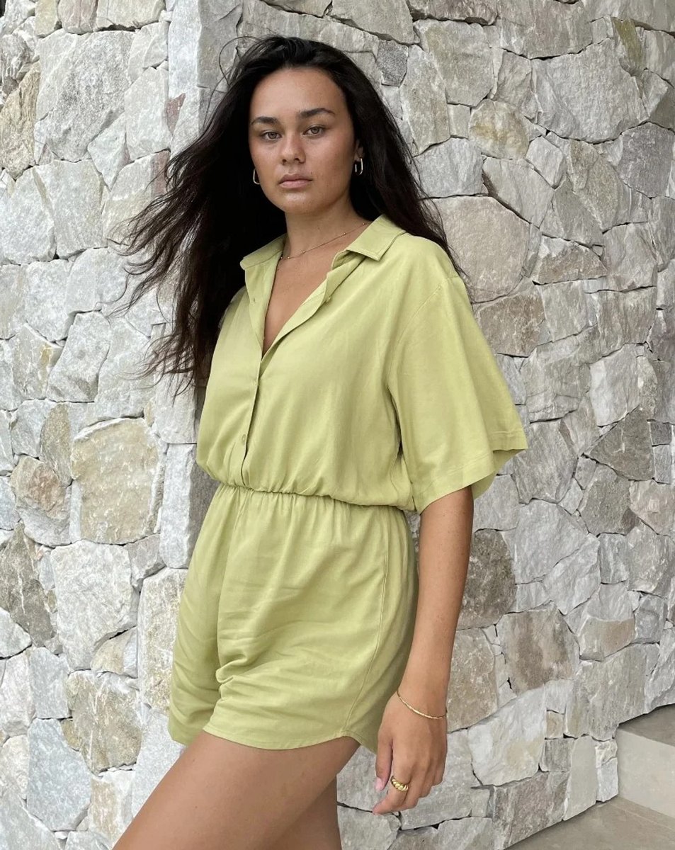 woman wearing pistachio coloured playsuit