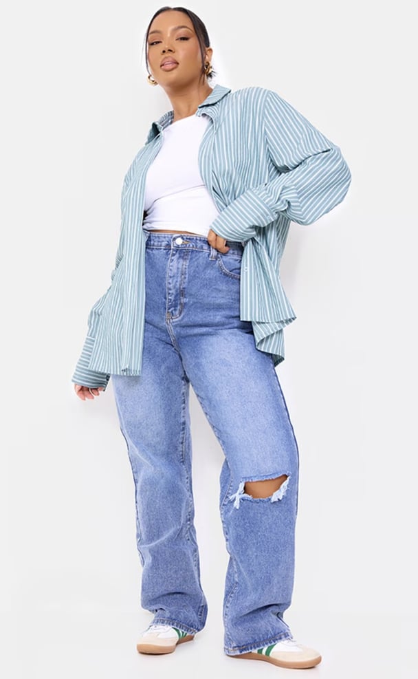 woman wearing distressed jeans