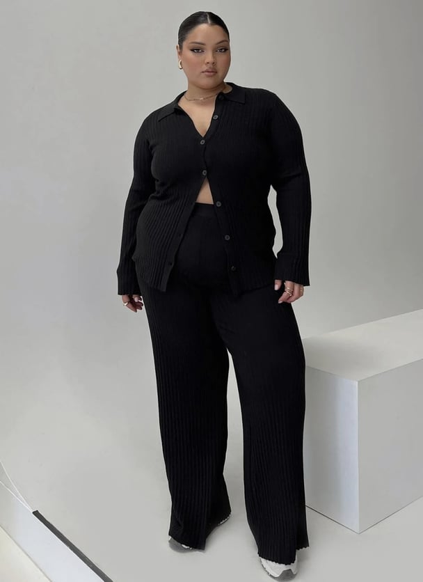 woman wearing black coord set from Princess Polly 