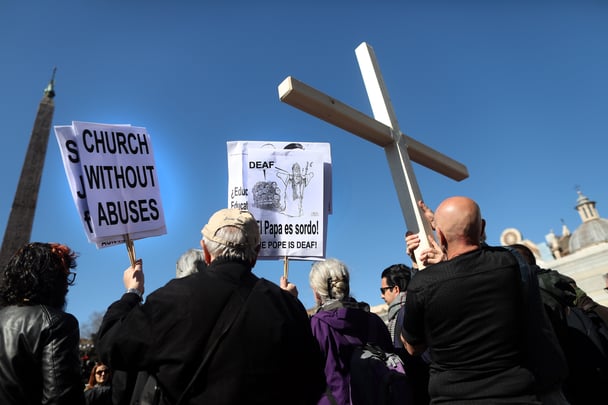 Victims and members of the global organization Ending Clergy Abuse (ECA) take part in a demonstration for the victims of sex abuse during the Papal summit