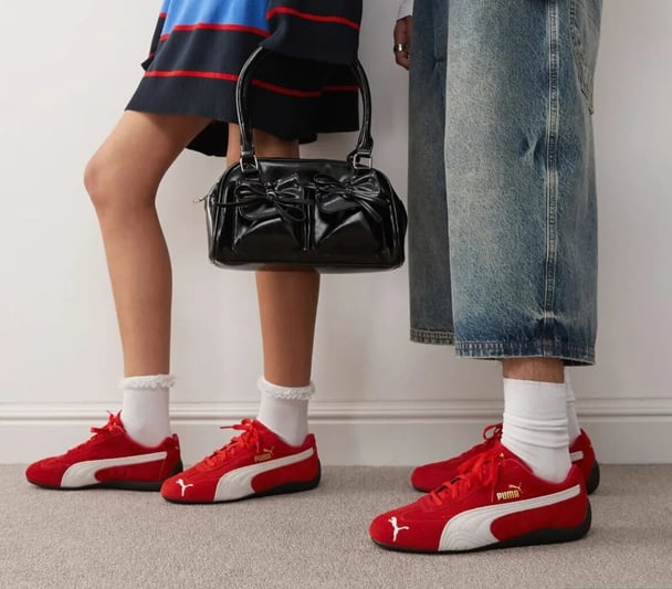 photo of red puma sneakers