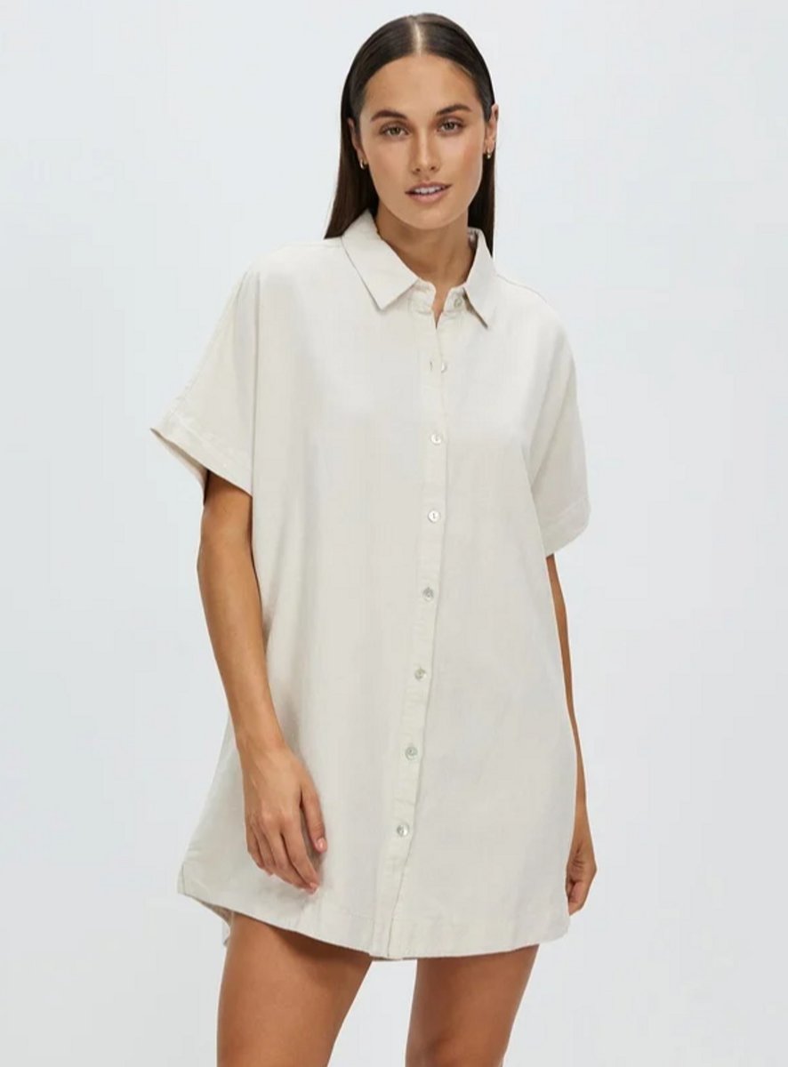 woman wearing shirt dress