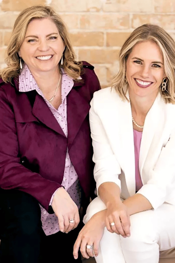 Ruby Franke and Jodi Hildebrandt pose for professional work images in suits.
