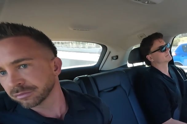 Chris and Sam in the car on their way to the dinner party.