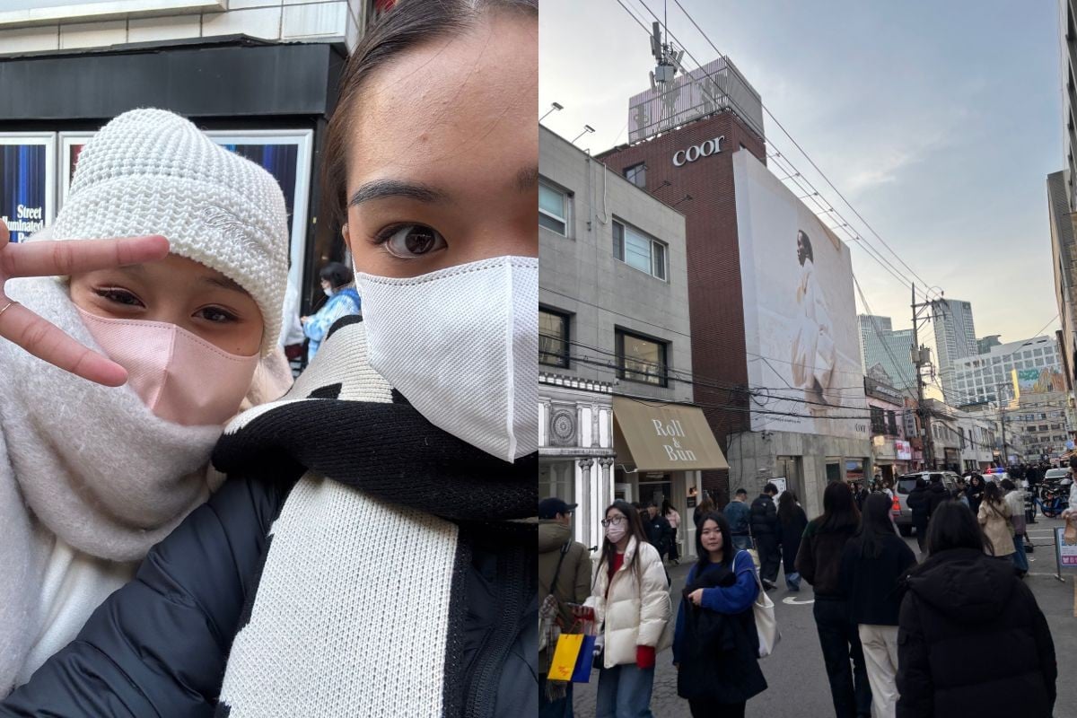 Selfie of two girls. Busy shopping street in Seoul, South Korea. 
