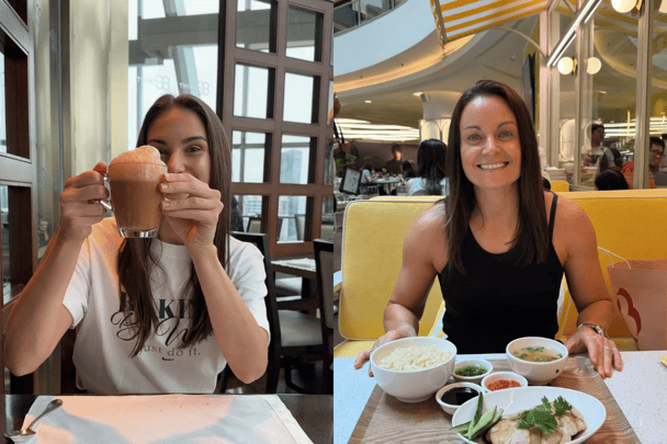 Two women in Kuala Lumpur eating Malaysian food.