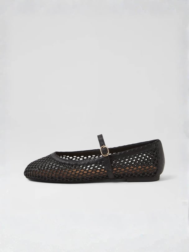 Black woven ballet flats with leather strap.